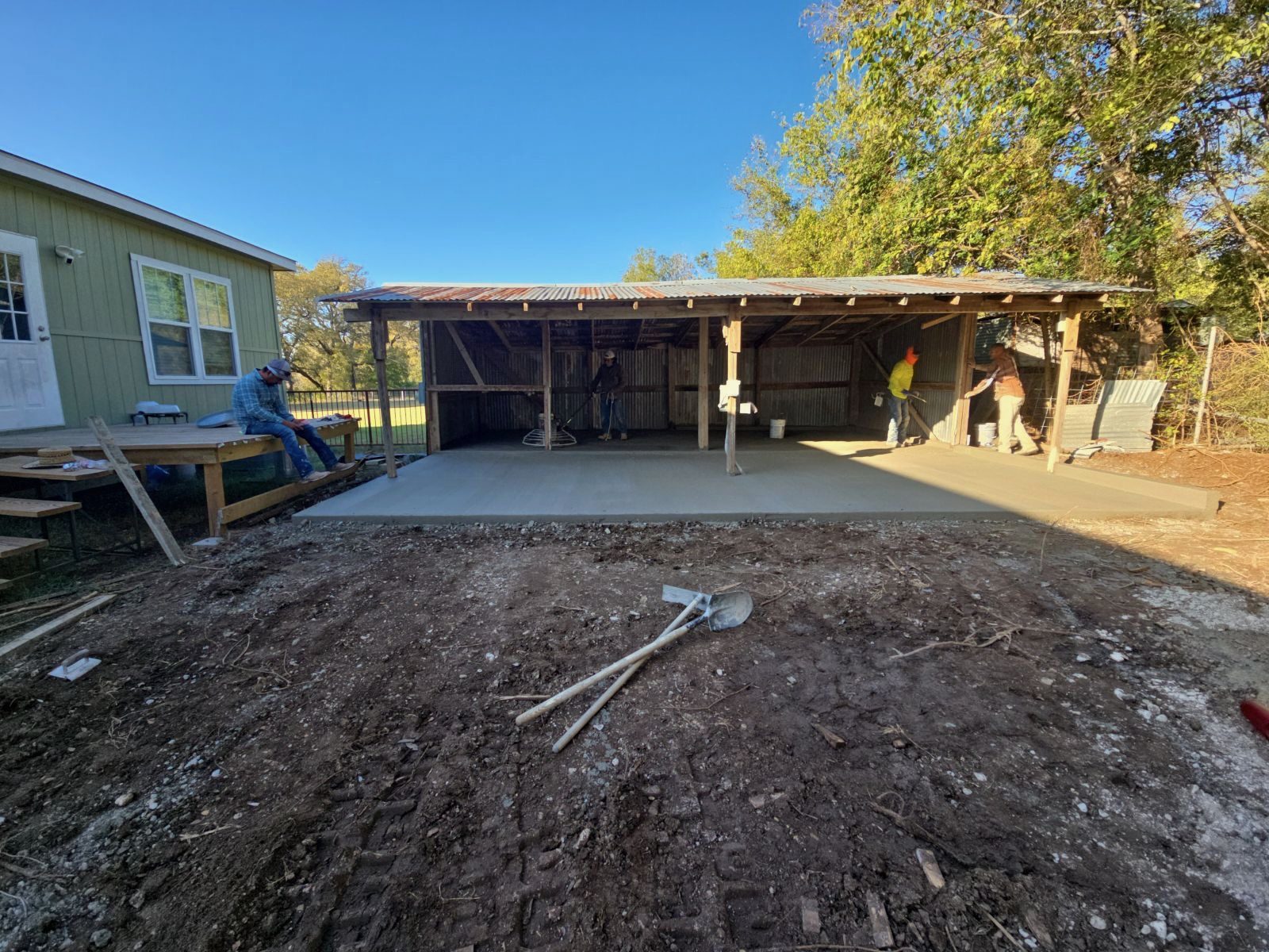 Carport slab poured beside the house
