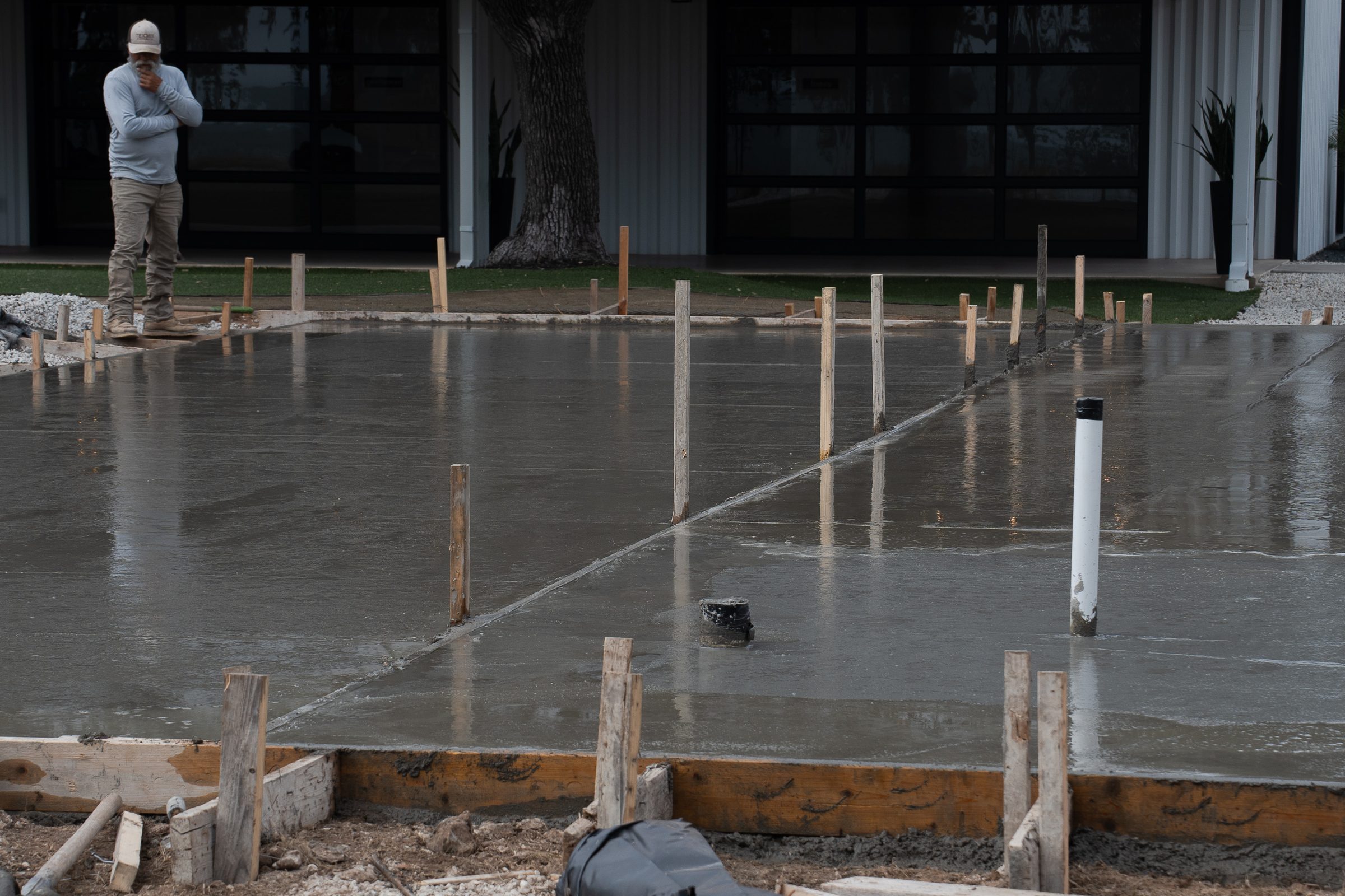 Fresh slab curing beside the main building