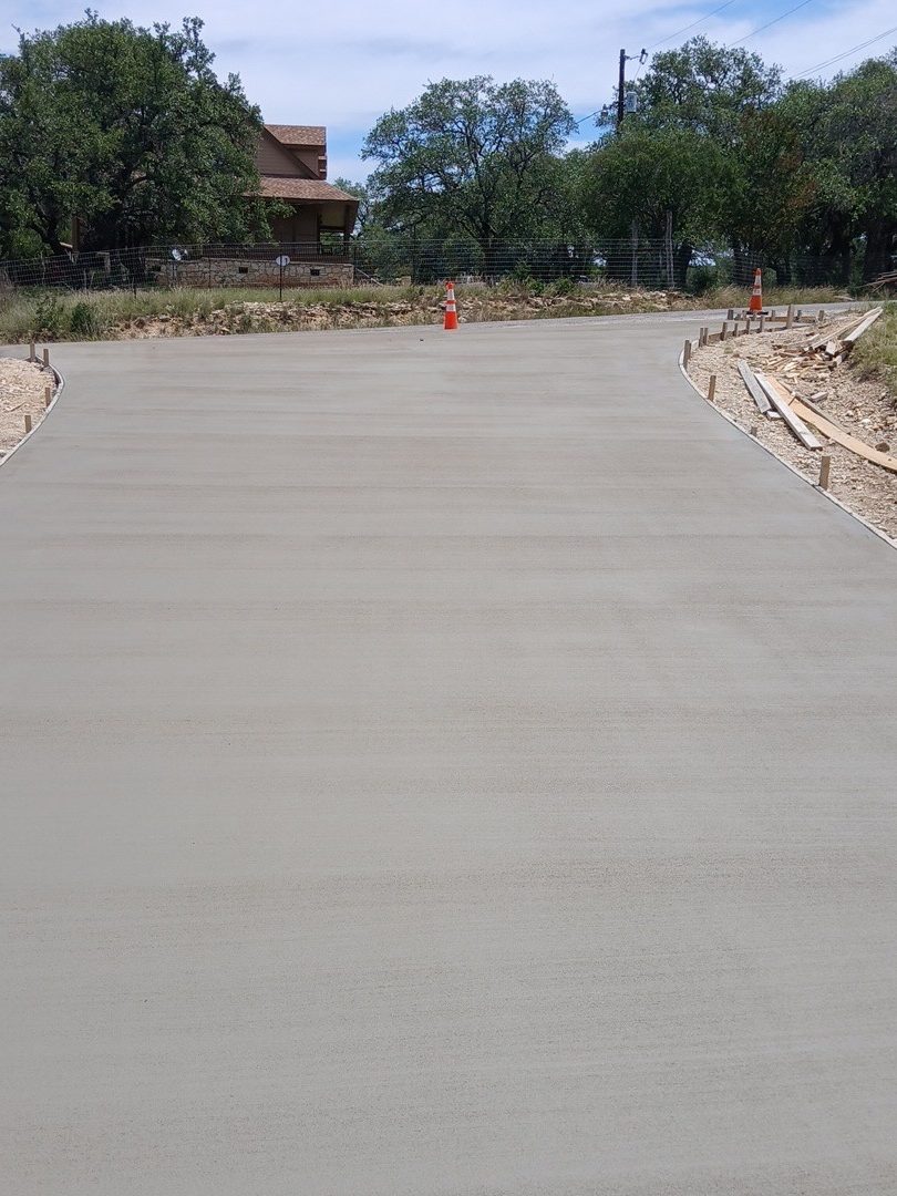 Concrete pad poured beside a house