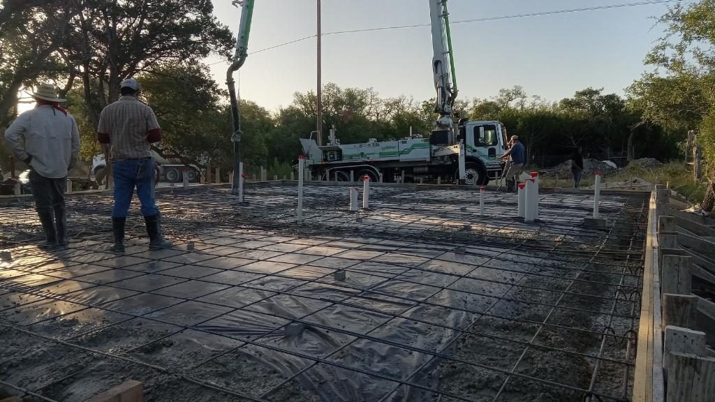 Crew placing concrete from the pump truck