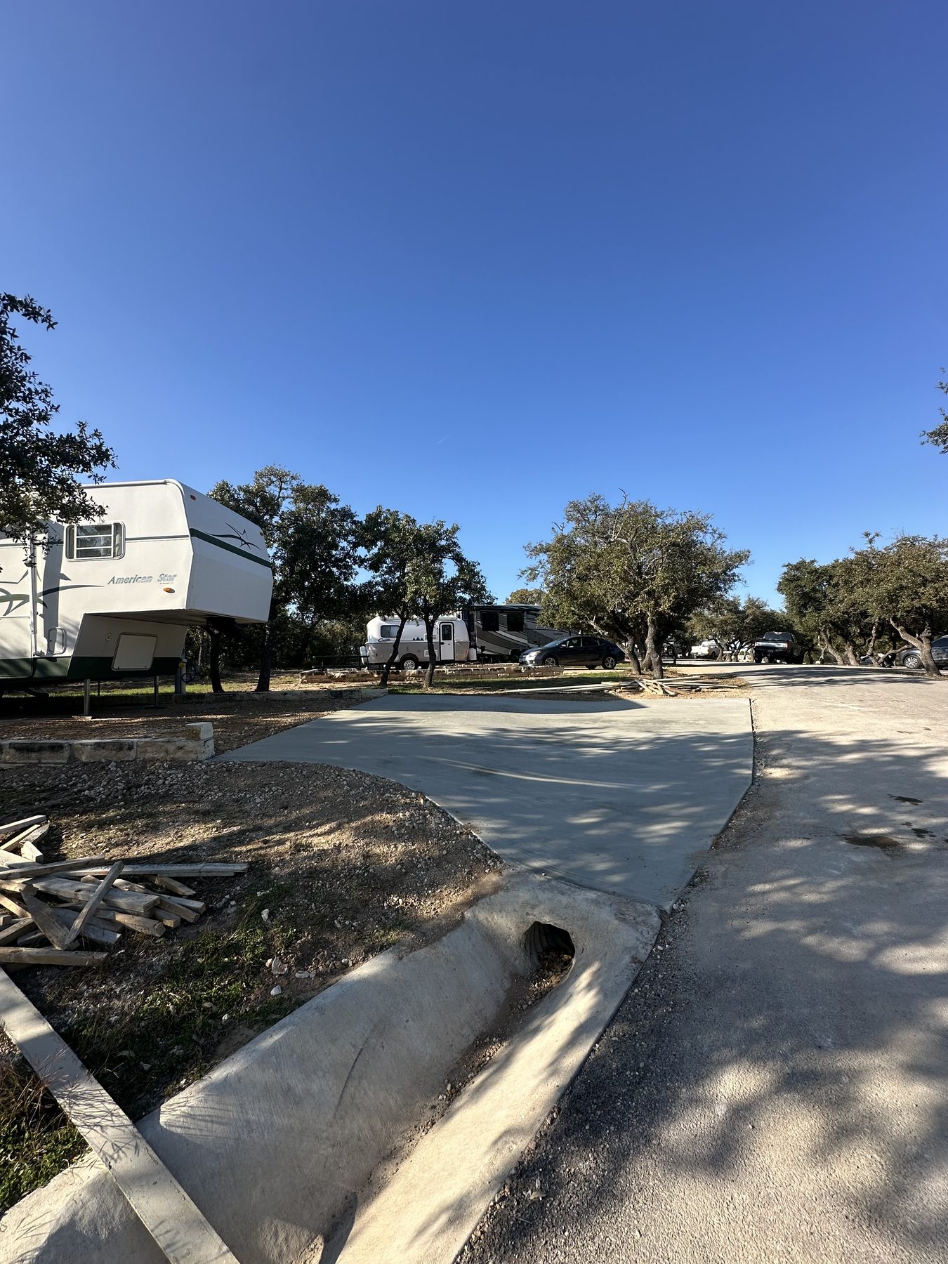 RV pad with a fifth wheel parked on it