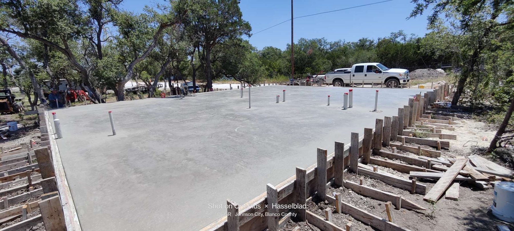 Wide RV parking pad beside a home