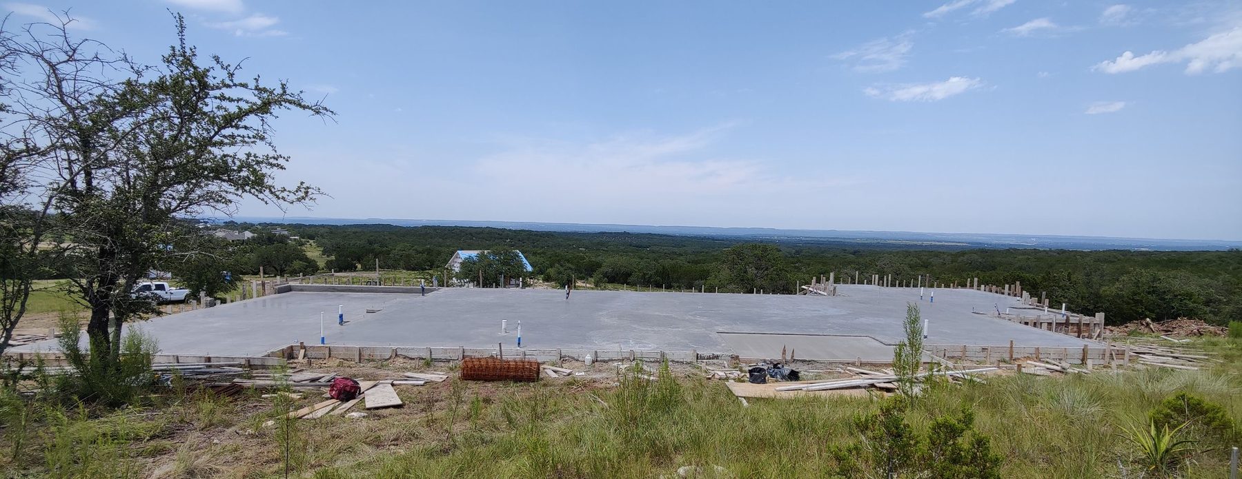 Slab foundation in an open field