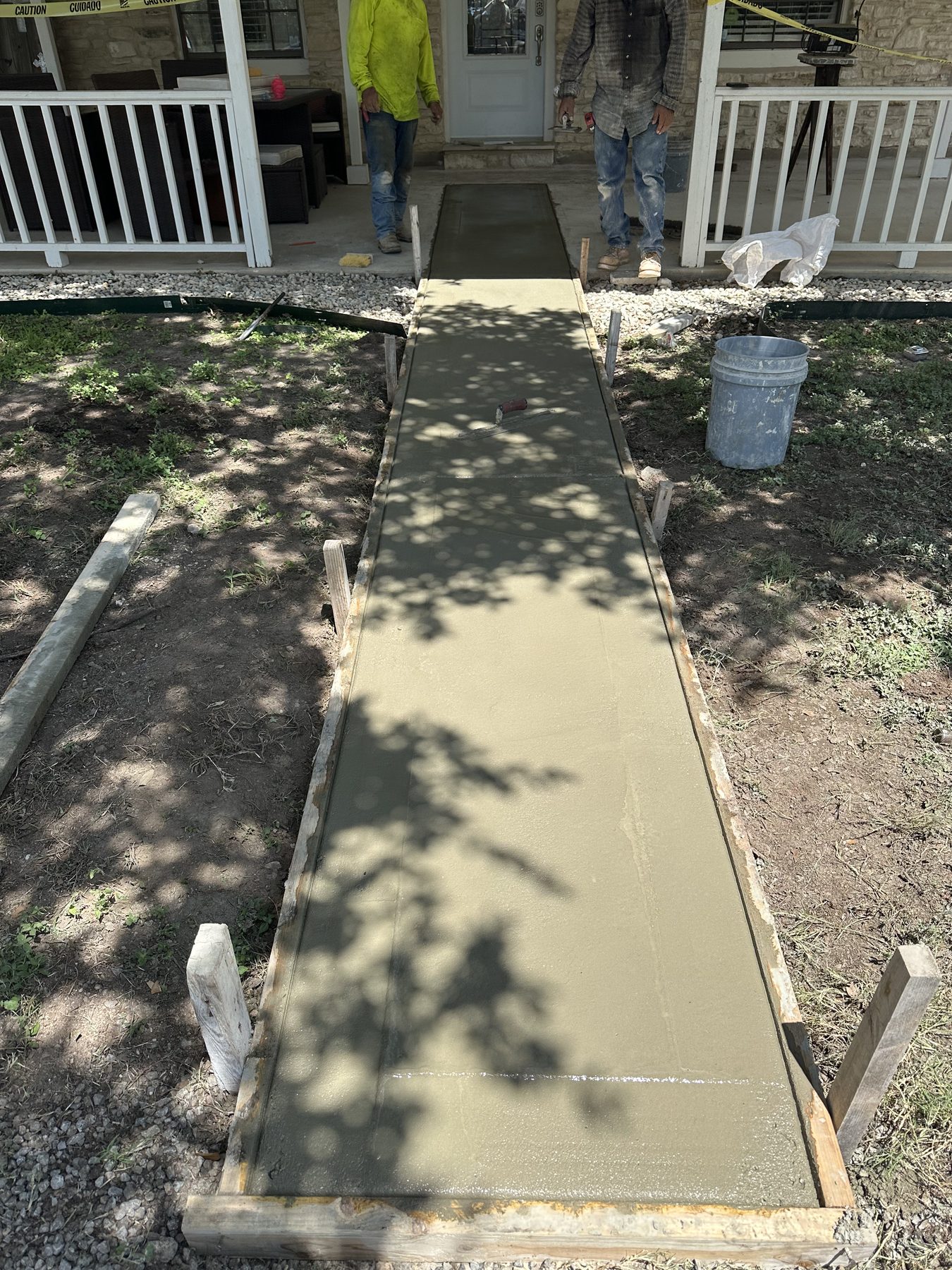 New walkway poured to the front porch